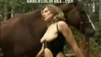 Nasty farm girl is trying perverted farm sex with a stallion