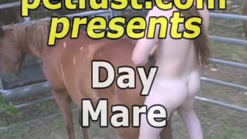 Kinky animal enthusiast stretches open the vagina of a brown female horse