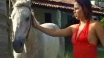 Beauty in a red dress gets fucked by a hung stallion