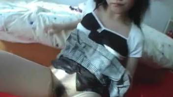 Japanese teen screws a black dog in an uncensored vid