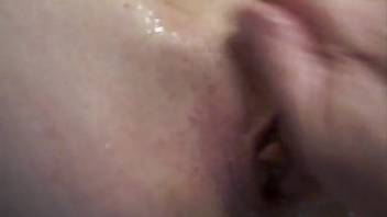 Cum-filled bestiality lover's cunt being fisted in POV