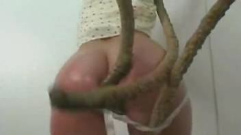 Tentacle rape video with a short-haired beauty