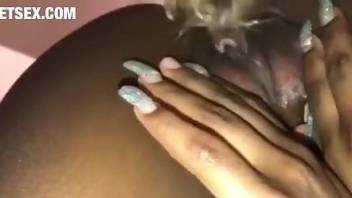Black babe with a hot cunt getting drilled by a dog