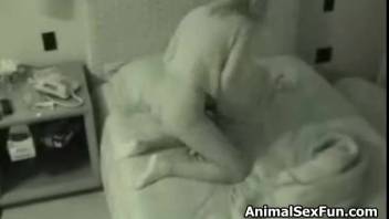Secretly recorded blonde woman engaging in bestiality