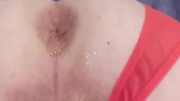 Nude woman inserts worms in her butt hole while on cam