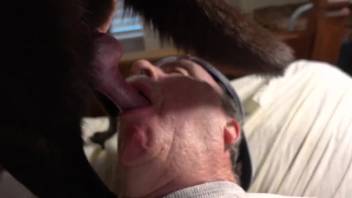 Guy blowing a canine's cock like a real slut