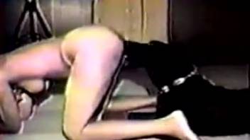 Classic clips of a hot lady handling loads of dog cock