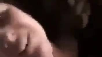 Slender dark-haired woman takes full canine penis into her oral cavity and vagina